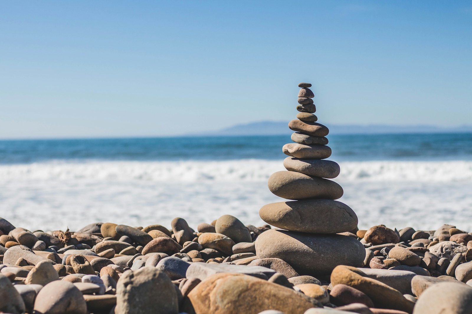 rocks balancing by the water